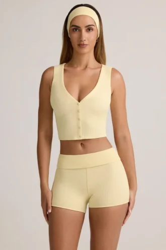 Top gilet con bottoni a costine in modal Lene, colore giallo crema