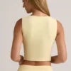 Top gilet con bottoni a costine in modal Lene, colore giallo crema Top gilet con bottoni a costine in modal Lene, colore giallo crema