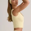 Top gilet con bottoni a costine in modal Lene, colore giallo crema Top gilet con bottoni a costine in modal Lene, colore giallo crema