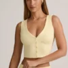 Top gilet con bottoni a costine in modal Lene, colore giallo crema Top gilet con bottoni a costine in modal Lene, colore giallo crema