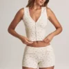 Top gilet con bottoni a costine in modal Lene con stampa floreale Top gilet con bottoni a costine in modal Lene con stampa floreale