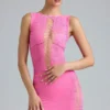 Top Gracie con collo alto e allacciatura decorata in rosa bubblegum Top Gracie con collo alto e allacciatura decorata in rosa bubblegum