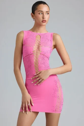 Top Gracie con collo alto e allacciatura decorata in rosa bubblegum