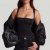 Top in jersey morbido con scollo quadrato e arricciature Mirandria in nero Top in jersey morbido con scollo quadrato e arricciature Mirandria in nero