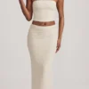 Top in pizzo senza spalline con ruches Tamia in avorio Top in pizzo senza spalline con ruches Tamia in avorio