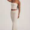 Top in pizzo senza spalline con ruches Tamia in avorio Top in pizzo senza spalline con ruches Tamia in avorio