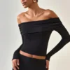 Top Kesia in Modal con spalle scoperte e maniche lunghe, colore nero Top Kesia in Modal con spalle scoperte e maniche lunghe, colore nero