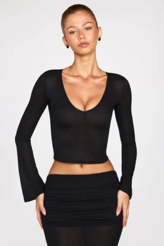 Top Liah in jersey trasparente con scollo profondo e maniche lunghe, colore nero