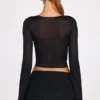 Top Liah in jersey trasparente con scollo profondo e maniche lunghe, colore nero Top Liah in jersey trasparente con scollo profondo e maniche lunghe, colore nero