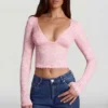 Top Lioren in pizzo trasparente con scollo profondo e maniche lunghe, colore rosa Top Lioren in pizzo trasparente con scollo profondo e maniche lunghe, colore rosa