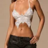 Top Maris Butterfly con lacci sul retro in bianco Top Maris Butterfly con lacci sul retro in bianco