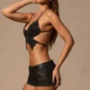 Top Maris con lacci sul retro a forma di farfalla in nero Top Maris con lacci sul retro a forma di farfalla in nero