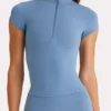 Top Soft Active con zip a un quarto in blu marino Top Soft Active con zip a un quarto in blu marino