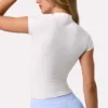 Top Soft Active con zip a un quarto in color latte Top Soft Active con zip a un quarto in color latte