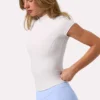 Top Soft Active con zip a un quarto in color latte Top Soft Active con zip a un quarto in color latte