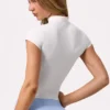 Top Soft Active con zip a un quarto in color latte Top Soft Active con zip a un quarto in color latte