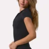 Top Soft Active con zip a un quarto in nero