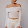 Top trasparente con spalle scoperte e maniche lunghe in bianco tenue Top trasparente con spalle scoperte e maniche lunghe in bianco tenue