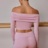 Top trasparente con spalle scoperte e maniche lunghe in rosa tenue Top trasparente con spalle scoperte e maniche lunghe in rosa tenue