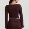 Top Wilona in maglia a costine con scollo a V, colore Espresso Top Wilona in maglia a costine con scollo a V, colore Espresso