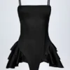 Tuta Corte con corsetto allacciato e volant Priaska in nero Tuta Corte con corsetto allacciato e volant Priaska in nero