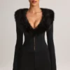 Tuta Corte con corsetto e bordi in pelliccia sintetica Nesta in nero Tuta Corte con corsetto e bordi in pelliccia sintetica Nesta in nero