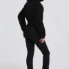 Tuta da sci impermeabile a strati con cintura in nero leopardato Tuta da sci impermeabile a strati con cintura in nero leopardato