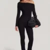 Tuta Erisen in Modal con spalle scoperte e maniche lunghe, colore nero Tuta Erisen in Modal con spalle scoperte e maniche lunghe, colore nero