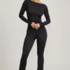 Tuta Eulalie in jersey morbido con fiocco, colore nero Tuta Eulalie in jersey morbido con fiocco, colore nero