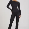 Tuta Eulalie in jersey morbido con fiocco, colore nero Tuta Eulalie in jersey morbido con fiocco, colore nero