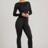 Tuta Eulalie in jersey morbido con fiocco, colore nero Tuta Eulalie in jersey morbido con fiocco, colore nero