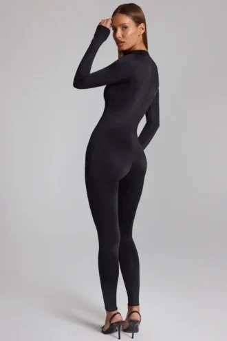 Tuta intera a maniche lunghe con collo alto Musa in nero Tuta intera a maniche lunghe con collo alto Musa in nero