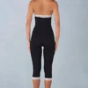 Tuta intera capri Calla in modal con bordi in pizzo in nero Tuta intera capri Calla in modal con bordi in pizzo in nero