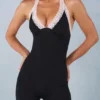 Tuta intera capri Calla in modal con bordi in pizzo in nero Tuta intera capri Calla in modal con bordi in pizzo in nero