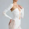 Tuta intera con cut-out decorata Melody in avorio Tuta intera con cut-out decorata Melody in avorio
