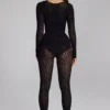 Tuta intera in maglia senza cuciture a maniche lunghe Irina in nero Tuta intera in maglia senza cuciture a maniche lunghe Irina in nero