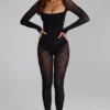 Tuta intera in maglia senza cuciture a maniche lunghe Irina in nero Tuta intera in maglia senza cuciture a maniche lunghe Irina in nero