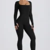 Tuta intera senza cuciture Super Sculpt in nero Tuta intera senza cuciture Super Sculpt in nero