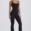 Tuta Intera Soft Active con cut-out sulla schiena in nero Tuta Intera Soft Active con cut-out sulla schiena in nero
