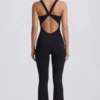 Tuta Intera Soft Active con cut-out sulla schiena in nero Tuta Intera Soft Active con cut-out sulla schiena in nero