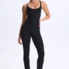 Tuta intera svasata con scollo profondo e schiena scoperta Kiki in Modal, colore nero Tuta intera svasata con scollo profondo e schiena scoperta Kiki in Modal, colore nero