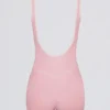 Tuta morbida e sportiva senza schienale a contrasto in rosa cipria Tuta morbida e sportiva senza schienale a contrasto in rosa cipria