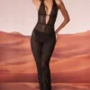 Tuta Ramona con scollo profondo decorata in nero Tuta Ramona con scollo profondo decorata in nero