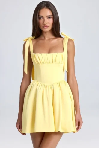 Vestito a corsetto drappeggiato Bellamy in Lemon Sherbet