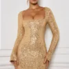 Vestito A-line con decorazioni Kiyara in oro Vestito A-line con decorazioni Kiyara in oro