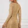 Vestito A-line con decorazioni Kiyara in oro Vestito A-line con decorazioni Kiyara in oro