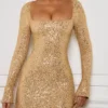 Vestito A-line con decorazioni Kiyara in oro Vestito A-line con decorazioni Kiyara in oro