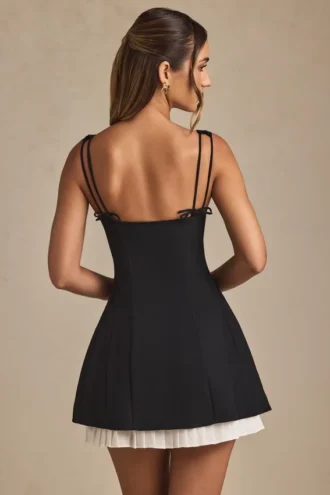 Vestito A-line plissettato con fiocco Cressida in nero