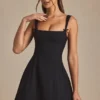 Vestito A-line plissettato con fiocco Cressida in nero Vestito A-line plissettato con fiocco Cressida in nero