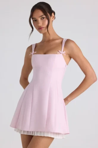 Vestito A-line plissettato con fiocco Cressida in rosa tenue